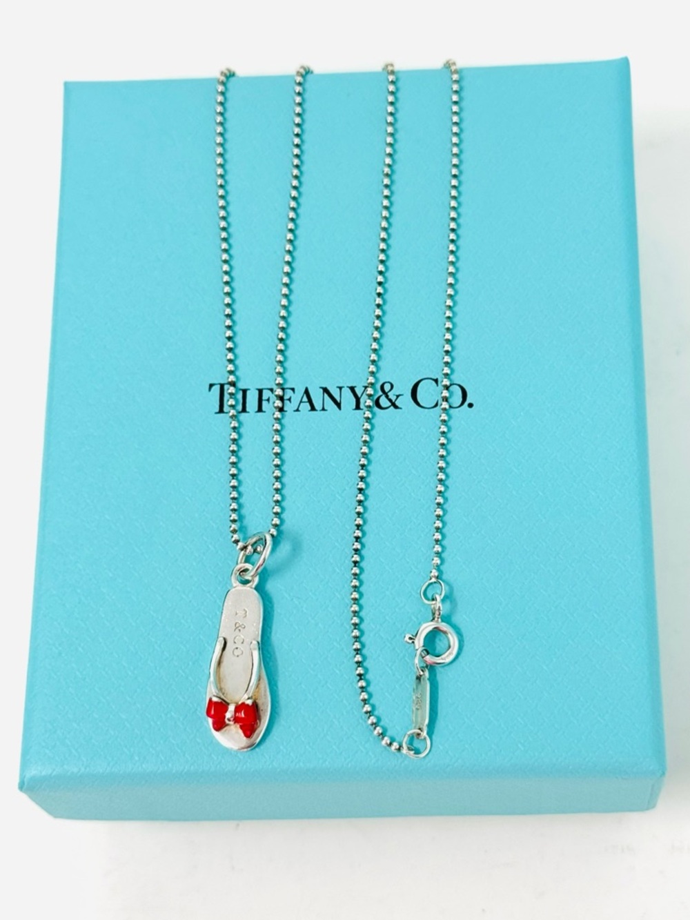 Authentic Tiffany & Co. Enamel Red  Flip-Flop Pendant Necklace.